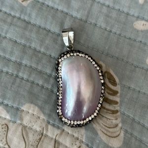 Bean shaped pendant shell with crystal embellishments silver tone bale 2 3/4”